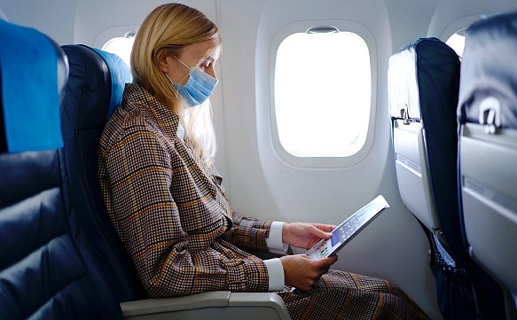 What should you do for your health when traveling in airports and airplanes?